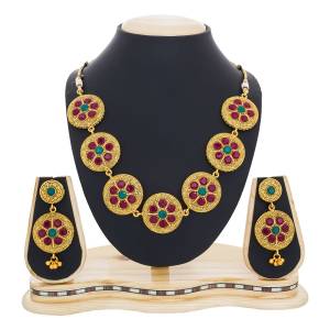 Add This Pretty Necklace Set To Your Collection In Golden Color With Multi Circles Beautified With Green And Pink Colored Stones. This Necklace Set Is Light Weight and Easy To Carry all day Long.