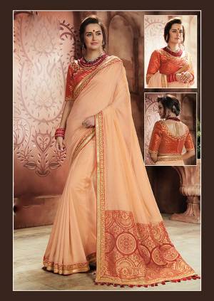 A timeless combination of peach-and-red is divine. Opt for a long rajrani drape to enhance that short pallu. 
