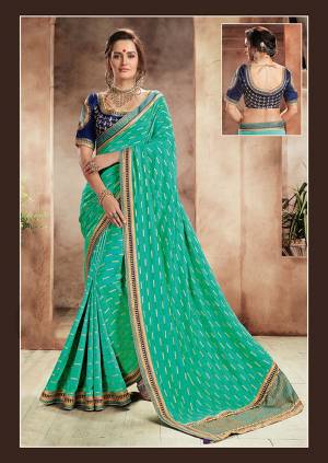 Present your tasteful appearance in this blissful sea green silk saree. Couple it up with dewy make-up and an elegant nivi drape to look statuesque.