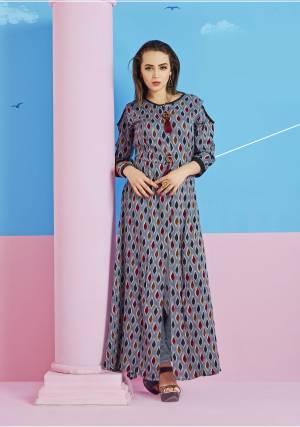 Cold Shoulder Pattern Is Here With This Kurti In Light Blue Color Fabricated On Rayon Cotton. This Kurti Has Small Prints All Over. This Unique Blue Color Near To Grey Will Earn You Lots Of Compliments From Onlookers.