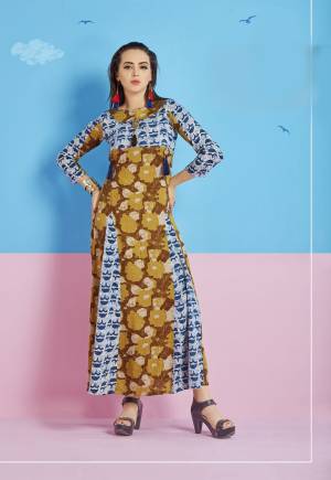 Colors Add Beauty To Any Garment, So Grab This Kurti In Musturd Yellow and Blue Color Fabricated On Rayon Cotton. This Kurti Is Light In Weight And Easy To Carry All Day Long.