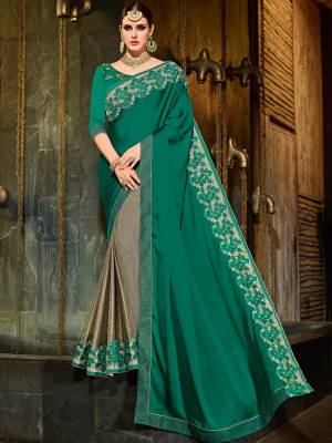 Gorgeously mesmerizing is what you will look at the next wedding gala wearing this beautiful green and grey color bright georgette and lycra pattern saree. Ideal for party, festive & social gatherings. this gorgeous saree featuring a beautiful mix of designs. Its attractive color and designer patch, stone, floral design work over the attire & contrast hemline adds to the look. Comes along with a contrast unstitched blouse.
