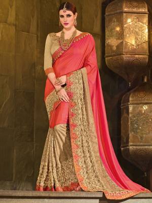 Flaunt your gorgeous look wearing this pink and beige color two-tone silk fabrics and lycra pattern saree. Ideal for party, festive & social gatherings. this gorgeous saree featuring a beautiful mix of designs. Its attractive color and designer patch, stone, floral design work over the attire & contrast hemline adds to the look. Comes along with a contrast unstitched blouse.