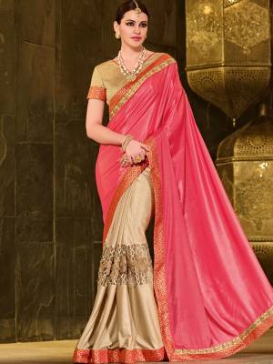 Presenting this pink and beige color crepe and lycra pattern net heavy work saree. Ideal for party, festive & social gatherings. this gorgeous saree featuring a beautiful mix of designs. Its attractive color and designer floral design, stone work over the attire & contrast hemline adds to the look. Comes along with a contrast unstitched blouse.