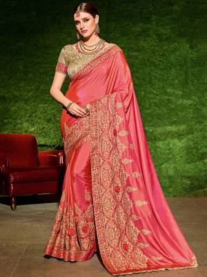 Look your ethnic best by wearing this pink color two-tone silk fabrics saree. Ideal for party, festive & social gatherings. this gorgeous saree featuring a beautiful mix of designs. Its attractive color and designer floral design, stone work over the attire & contrast hemline adds to the look. Comes along with a contrast unstitched blouse.