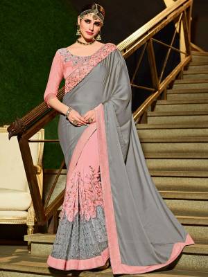 Wear this grey and pink color bright georgette and bright georgette with net work saree. Ideal for party, festive & social gatherings. this gorgeous saree featuring a beautiful mix of designs. Its attractive color and designer floral design, stone work over the attire & contrast hemline adds to the look. Comes along with a contrast unstitched blouse.