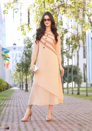 Take Your Style To The Next Level With The Peach Color Fabulous Kurti. It Features A Classic Design That Exudes Beauty And Confidence. You Can Wear It As Your Traditional Attire For Special Occasions. It Is Made From Superior Quality Georgette That Makes It Skin Friendly And Comfortable. 