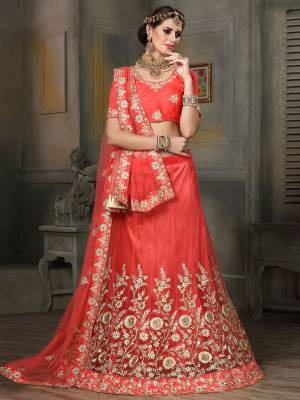 Here Is A New Shade Of Red With This Designer Lehenga Choli In Crimson Red Color Paired With Crimson Red Colored Dupatta. Its Blouse Is Fabricated On Art Silk Paired With Net Lehenga And Dupatta. Its Is Light In Weight And easy To Carry All Day Long.