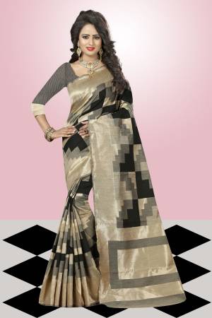 For A Bold And Beautiful Look In Ethnic Wear, Grab This Black And Beige Colored Saree Fabricated On Kanjivaram Art Silk That Gives A Royal Look To Your Personality. Buy this Saree Now.