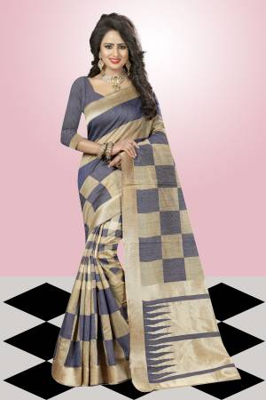 Add A Liitle Charm To Your Beauty With This Grey And Beige Colored Saree Fabricated On Kanjivaram Art Silk. This Saree Will Make You Earn Lots Of Compliments From Onlookers. Buy This Pretty Saree Now.