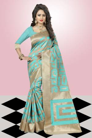 Add A Liitle Pinch Of Colors To Your Attire With Contrasting Light Colors. Grab This Aqua Blue And Beige Colored Saree Paired With Aqua Blue Colored Blouse. This Saree Is Fabricated On Kanjivaram Art Silk Which Is Light In Weight And Easy To Drape. Buy This Saree Now.