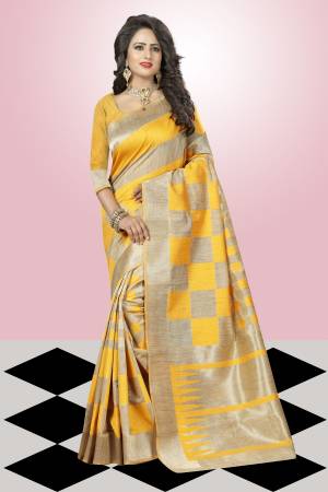 Shine Bright With This Musturd And Beige Colored Saree Paired With Musturd Colored Blouse. This Saree Is Fabricated On Knjivaram Art Silk. Buy This Lovely Saree Now.