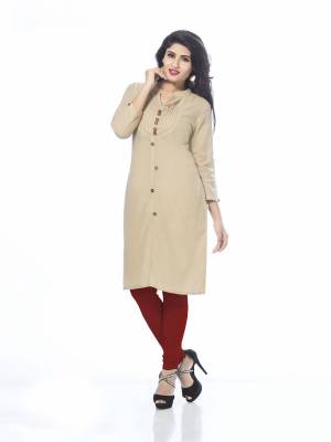 Simple And Elegant Looking Kurti Is Here In Beige Color Fabricated On Cotton. This Pretty Kurti Can Be Paired With Any Contrasting Colored Pants Or Leggings. Buy It Now.