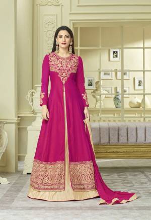 Bright And Visually Appealing Colors Give Your Personality An Attractive Look. Grab This Designer Indo-Western Suit In Magenta Pink Colored Top Paired With Beige Colored Lehenga And Magenta Pink Colored Dupatta. Its Top Is Fabricated On Art Silk Paired With Soft Art Silk Lehenga And Chiffon Dupatta. Its All Three Fabrics Ensures Superb Comfort All Day Long.