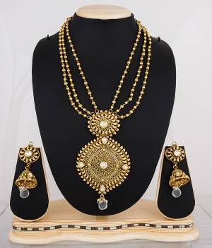 If Layers Is Your Choice Than Grab This Pretty Necklace Set With Multiple Chains Paired With Jhumki Style Earrings. 