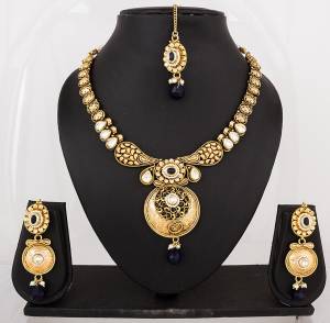 Earn Lots Of Compliments Wearing This Attractive Necklace Set In Golden Color Beautified with Navy Blue Colored Stone Work. This Can be Paired With Navy Blue Or Any Contrasting Colored Attire. Buy Now.