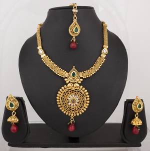 Look Pretty Wearing This Necklace Set With Maroon Or Any Contrasting Colored Traditional Attire. This Necklace Set Is Made On Copper So It Is Light In Weight And Easy To Carry All Day Long.