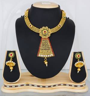 Feel Like A Queen Wearing This Rich And Elegant Necklace Set In Golden Color Beautified With Multi Colored Stones. It Is Light In Weight And Easy To Carry All Day Long.