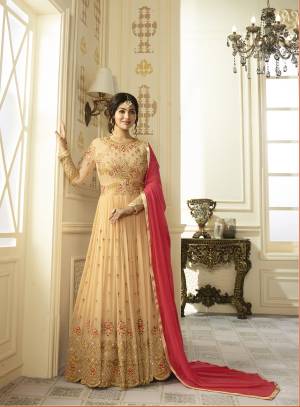 Simple And Elegant Looking Designer Floor Length Suit Is Here In Beige Color Paired With Beige Colored Bottom And Pink Colored Dupatta. Its Top Is Fabricated On Georgette Paired With Santoon Bottom And Chiffon Dupatta. This suit Ensures Superb Comfort All Day Long. Buy Now.