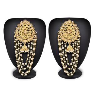 Grab This Attractive Looking Set Of Earrings In Golden Color Beautified With Stones And Pearls. This Pretty Earrings Can Be Paired With Any Colored Attire Which Will Earn You Lots Of Compliments From Onlookers.