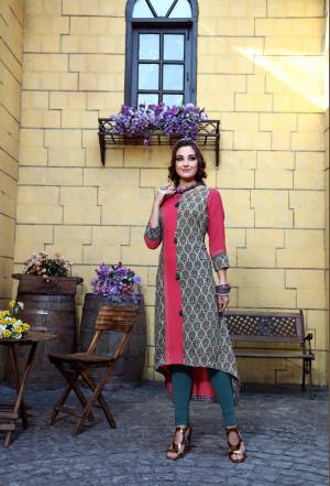 High Low Patterned Readymade Kurti Is Here In Pink And Grey Color Fabricated On Cotton. It IS Beautified With Prints All Over And Also Easy To Carry All Day Long.