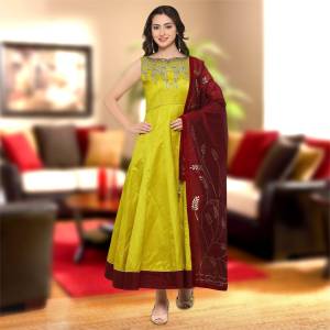 Shine Bright Wearing This Attractive Gown In Pear Green Color Paired With Contrasting Maroon Colored Dupatta. This Gown Is Fabricated On Art Silk Paired With Chanderi Cotton Dupatta. It Is Light In Weight And Easy Ti Carry all Day Long. Buy This Semi-Stitched Gown Now.