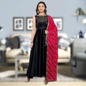 Enhance Your Beauty Wearing This Gown In Black Color Paired With Contrasting Magenta Pink Colored Dupatta. This Gown Is Fabricated On Satin Silk Paired With Georgette Fabricated Dupatta. It Is Soft Towards Skin And Easy To Carry All Day Long. Buy Now.