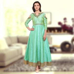Here Is A Very Pretty Shade Of Green With This Semi-Stitched Gown In Light Green Color Fabricated On Art Silk. Its Beautiful Cold Shoulder Pattern And Embroidery Over The Neckline Will Earn You Lots Of Compliments From Onlookers. Buy Now.