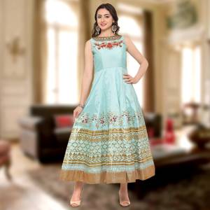 Earn Lots Of Compliments From Wearing This Gown In Baby Blue Color Fabricated On Art Silk. This Gown Is Light Weight And Ensures Superb Comfort All Day Long.