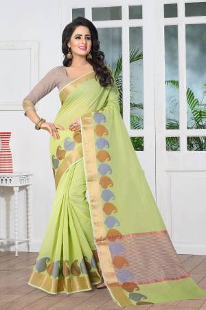 Here Is Very Pretty Shade Of Green With This Saree In Pastel Green Color Paired With Beige Colored Blouse. This Saree And Blouse Are Fabricated On Banarasi Art Silk Beautified With Weave Over The Border. Buy This Saree Now.