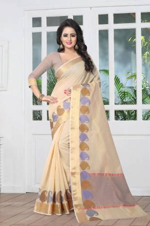 Flaunt Your Rich And Elegant Taste Wearing This Saree In Cream Color Paired With Beige Colored Blouse. This Saree And Blouse Are Fabricated On Banarasi Art Silk. This Pretty Saree Will Definitely Earn You Lots Of Compliments From Onlookers. Buy Now.
