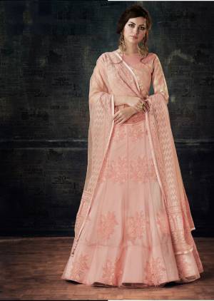 Dolled Up Yourself With This Very Pretty Designer Lehenga Choli In Pastel Pink Color Paired With Pastel Pink Colored Dupatta. Its Blouse Is Fabricated On Jacquard Silk Paired With Net Fabricated Lehenga And Dupatta. It Is Light Weight And Easy To Carry Throughout The Gala.