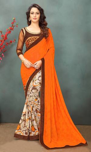 Shine Bright Wearing This Saree In Attractive Orange And Off-White Color Paired With Brown Colored Blouse. This Saree Is Fabricated On Georgette Paired With Art Silk And Net Fabricated Blouse. Buy This Saree Now.
