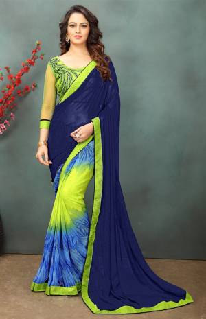 Attractive Combination Is Here With This Saree In Blue And Pear Green Color Paired With Pear Green Colored Blouse. This Saree Is Fabricated On Georgette Paired With Art Silk And Net Fabricated Blouse.