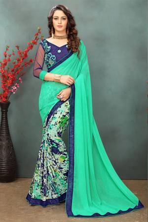 Shades Of Green Always Gives A Fresh Look Everytime To Wear It. So Grab This Sea Green Colored Saree Paired With Contrasting Blue Colored Blouse. This Saree Is Fabricated On Georgette Paired With Art Silk Fabricated Blouse. Its Fabrics Ensures Superb Comfort All Day Long. Buy Now.