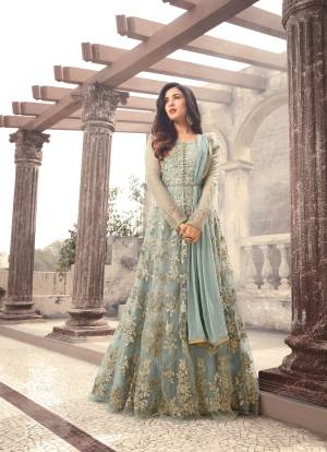 Very Beautiful Designer Floor Length Suit Is Here Baby Blue Color Paired With Baby Blue Colored Bottom And Dupatta. Its Top Is Fabricated On Net Paired With Santoon Bottom And Chiffon Dupatta. It Is Beautified With Heavy Embroidery All Over It.