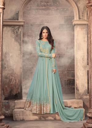 Another Color Is Available In Designer Floor Length Suit In Light Blue Color Paired With Light Blue Colored Bottom And Dupatta. Its Top Is Fabricated On Net Paired With Santoon Bottom And Chiffon Dupatta. Its Attractive Sequence Work Over The Panel Is Giving The Suit Quite Unique Look.