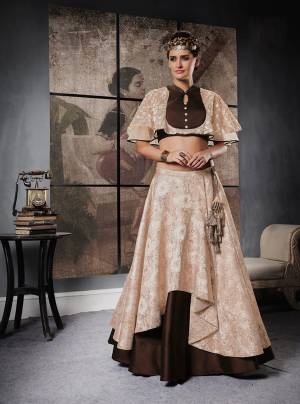 All Occasion Wear Designer Lehenga Choli IS Here With This Lehenga Choli In Beige And Brown Color. Its Blouse Is Fabricated On Brocade And Net Paired With Jacquard Silk Lehenga And Net Dupatta. Buy Now.