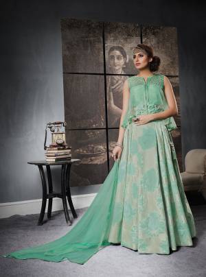 With This Beautiful Designer Pattern, Grab This Lehenga Choli In Sea Green Color Paired With Sea Green Colored Dupatta. Its Blouse Is Fabricated On Art Silk And Net Paired With Jacquard Silk Lehenga And Net Dupatta. It Is Light Weight And Easy To Carry All Day Long.