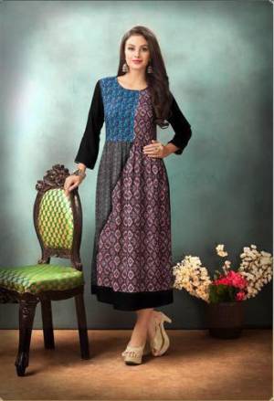 Grab This Pretty Kurti For Your Casual Wear In Multi Color Fabricated On Rayon Cotton. This Kurti Is Beautified with Prints And Available In Many Sizes. Buy This Kurti Now.