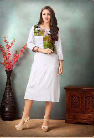 Rich, Simple And Elegant Looking Readymade Kurti Is Here In White Color. It Is Fabricated On Rayon Cotton Which Is Soft Towards Skin And Easy To Carry All Day Long.