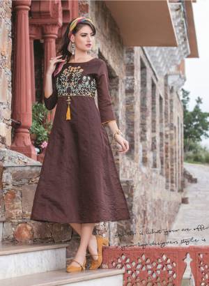 Here Is A Lovely Kurti In Brown Color Fabricated On Chanderi Silk. This Readymade Kurti Is Available In Many Sizes. Also It Is Beautified With Thread Work Over The Yoke. Buy Now.
