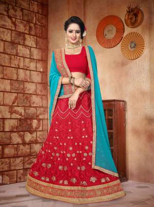 Adorn The Lovely Angelic Look Wearing This Lehenga Choli In Red Color Paired With Contrasting Sky Blue Colored Dupatta. Its Blouse Is Fabricated On Art Silk Paired With Georgette Lehenga And Georgette Dupatta. Its All Three Fabrics Ensures Superb Comfort All Day Long.
