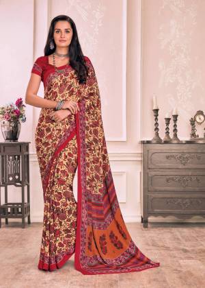 Pure Traditonal Look Is Here This Saree With Cream And Red Color Paired With Red Colored Blouse. This Saree And Blouse Are Fabricated On Crepe Beautified With Bold Prints All Over It. Buy This Pretty Saree Now.