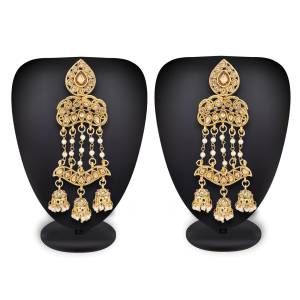 Grab This Beautiful Pair Of Earrings In Golden Color That Can Be Paired With Any Colored Traditonal Attire As It Is Beautified With Beige Colored Stone And White Colored Pearl. Buy This Earrings Set Now.