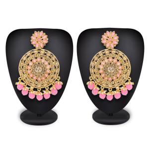 For The Pretty Pink Dress, Grab This Lovely Pair OF Earrings In Golden Color Beautified With Pink Colored Stones. Buy This Earrings Now.