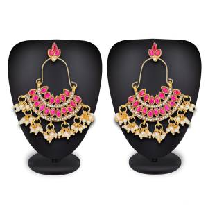 For The Pretty Pink Dress, Grab This Lovely Pair OF Earrings In Golden Color Beautified With Pink Colored Stones. Buy This Earrings Now.