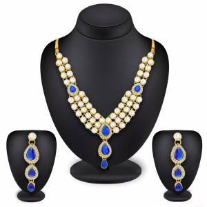 Heavy Queen Type Necklace Set Is Here In Golden Color Made On Mix Metal Beautified With Stone Work In Maroon And White. This Necklace Set Can Be Paired With Lehenga Choli Or Saree. Buy It Now.
