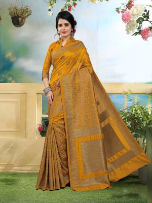 This Pretty Saree Will Give A Heavy Look When You wear It. It Is In Musturd Yellow Color Paired With Musturd Colored Blouse. This Saree And Blouse Are Fabricated On Art Silk Beautified With Heavy Weave. Buy This Saree Now.