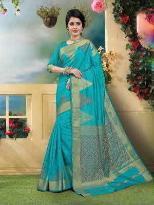 Look Simple And Elegant Wearing This Saree In Turquoise Blue Color Paired With Turquoise Blue Colored Blouse. This Saree And Blouse Are Fabricated On Art Silk Beautified With Weave. Buy It Now.
